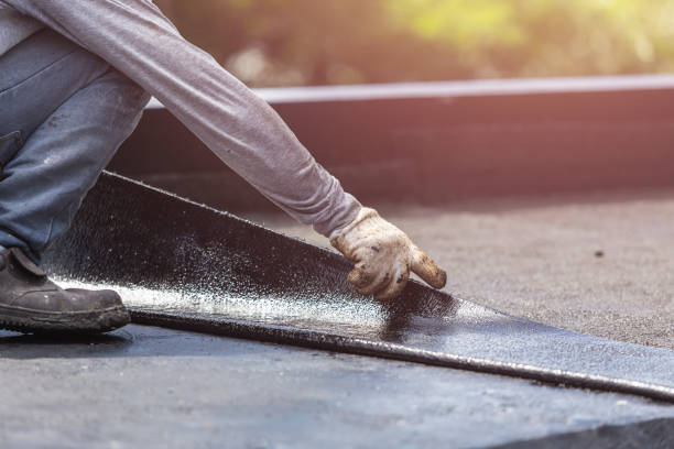 Professional Basement Waterproofing technician working in Paeonian Springs, VA